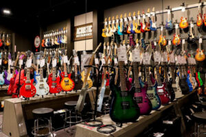 Guitar Center electric guitar wall - Accel Group Portfolio Project